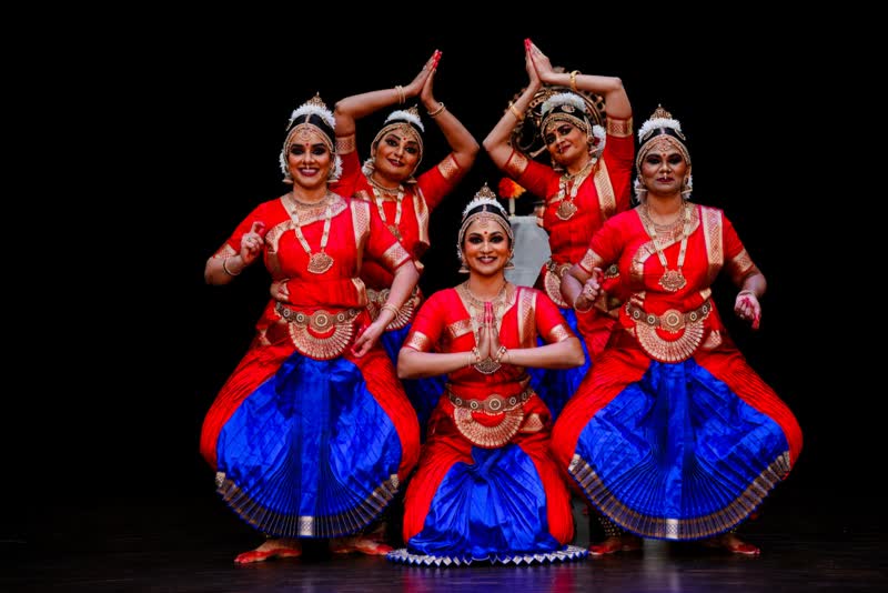 Group of classical dancers performing together