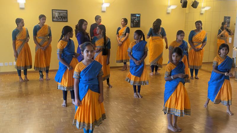 Students in their practice sarees before the Pooja